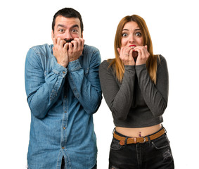 Frightened man and woman