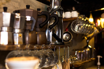 Group of empty cups in many rows of cup for coffee and kettle