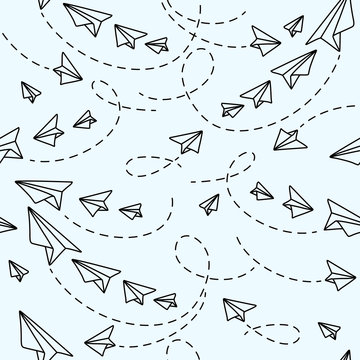 flying paper planes on light blue background