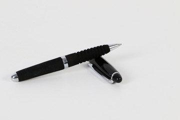 black ball pen is lying  in the studio