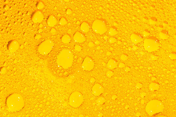 golden liquid soap bubbles as background