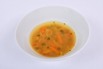 Tasty miso vegetable soup on a white