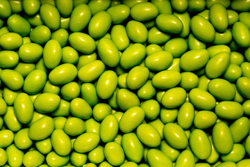 sugar coated colorful chocolates close up patterns