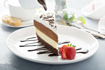 Three chocolate layered mousse cake