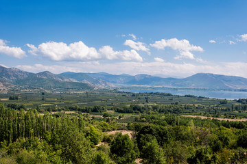 Naklejka na ściany i meble Panoramic view from mountain on the Kastoria town and neighborhood Orestias lake. Greece