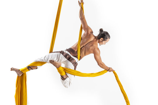 Man Making Acrobatic Dance With Fabrics