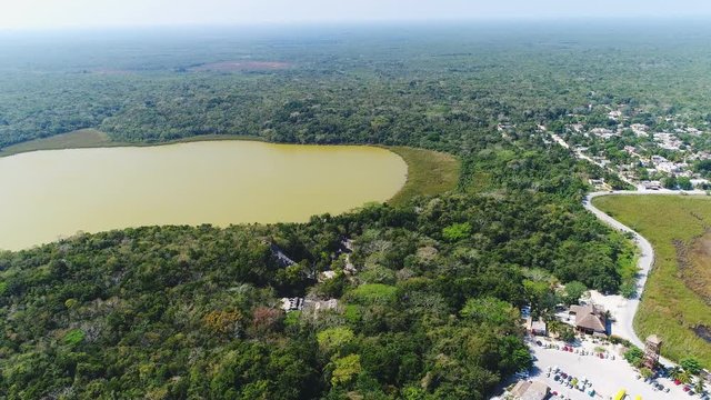 Aerial view of ruins of ancient Mayan city of Coba, lush jungle and two lakes (Lake Coba and Lake Macanxoc) - Yucatan Peninsula, Mexico from above, 4k UHD