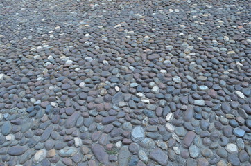 Droga - ulica wybrukowana drobnymi kamykami, Włochy © Ewa