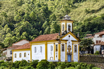 Fototapeta na wymiar Old catholic church of the 18th century located in the center of the famous and historical city of Ouro Preto in Minas Gerais
