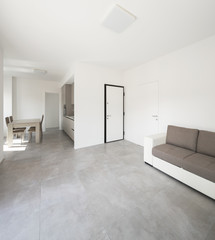 Naklejka na ściany i meble Modern living-room in new apartament with furniture