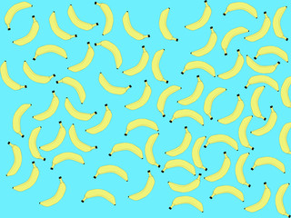 Yellow bananas are randomly arranged on a blue background