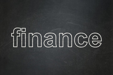 Fototapeta premium Banking concept: text Finance on Black chalkboard background