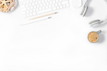Beautiful light minimalistic mockup. White modern keyboard, mouse, headphones, pencils, vase with...