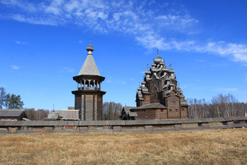 Ancient wooden church against the blue sky