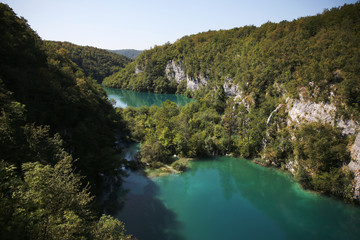 Fototapeta na wymiar Beautiful Landscape of Calm Lake and Mountains in Plivitce National Park, Croatia