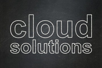 Cloud computing concept: text Cloud Solutions on Black chalkboard background