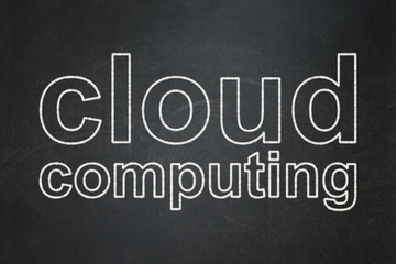 Obraz premium Cloud networking concept: text Cloud Computing on Black chalkboard background