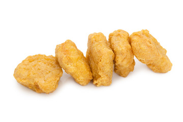 Fried chicken nuggets isolated on white background.