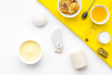 Aromatic theraphy and delicate skin care. Spa set based on honey on white background top view