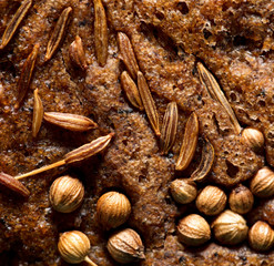 sesame seeds on black bread as a background