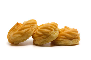 Delicious eclair vanilla cream, choux dough filled with a cream, homemade bakery