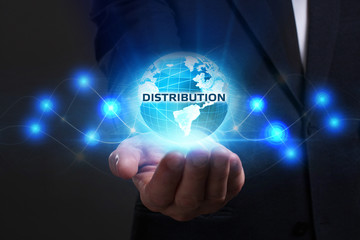 Business, Technology, Internet and network concept. Young businessman working on a virtual screen of the future and sees the inscription: Distribution