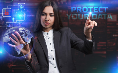 The concept of business, technology, the Internet and the network. A young entrepreneur working on a virtual screen of the future and sees the inscription: Protect your data