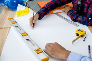 Architects who work with blueprints, inspecting workplace engineers for architectural planning,...