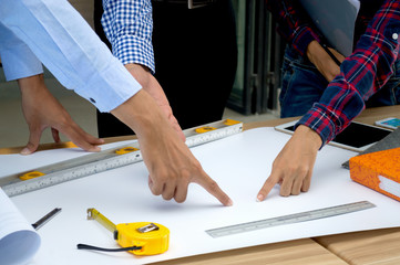 Architects who work with blueprints, inspecting workplace engineers for architectural planning,...