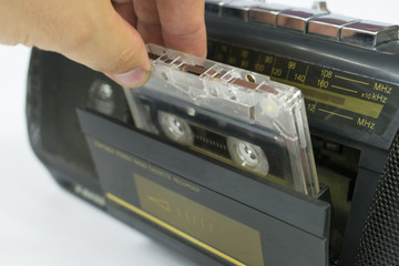 insert cassette into tape recorder