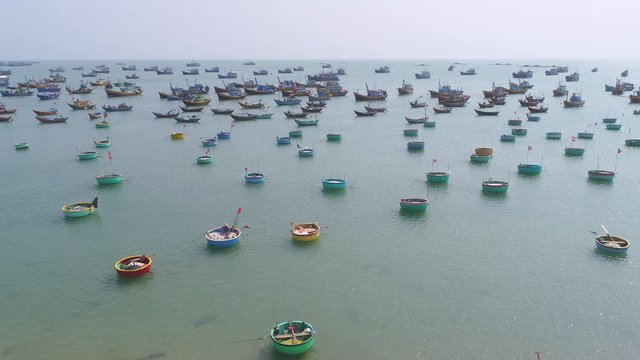 4k Aerial Movie of Vietnamese Small fishing boats and fishing ships in harbour, MuiNe, Vietnam