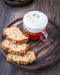 Banana cake with seeds and a cup of hot tea