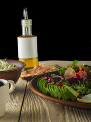 fresh salad with tomato, egg and toast