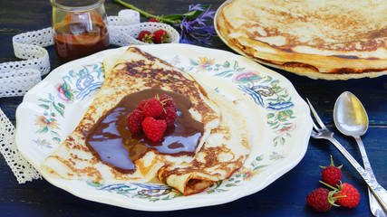 pancakes thin with chocolate and berries