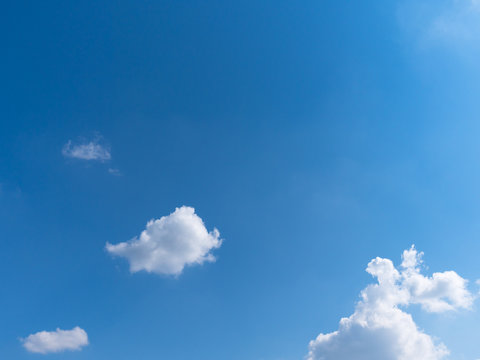 Beautiful blue sky with bright white clouds