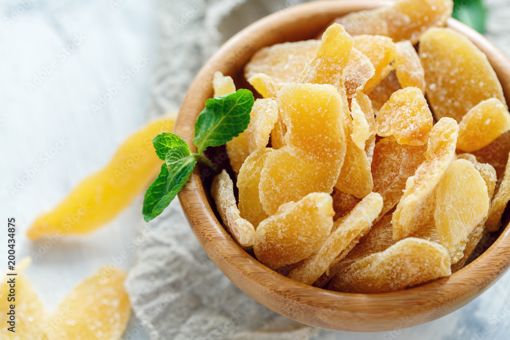 Wall mural slices of candied ginger closeup.