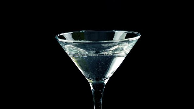 Martini Cocktail Poured And Olives Added