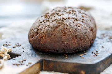 Loaf of artisan rye bread with cumin.