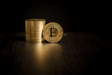  Bitcoin coins on black background
