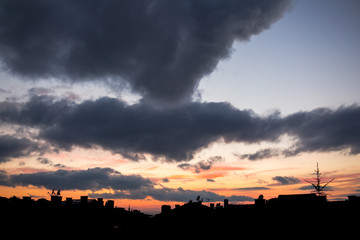 city sunrise and sunset of colorful skyscapes cloudscapes of a city