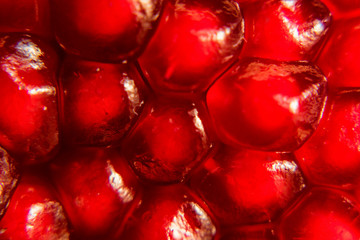 Ripe juice pomegranate seeds background