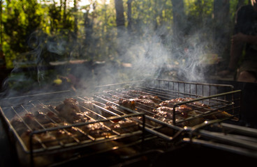 Barbecue with delicious grilled meat on the grill grate