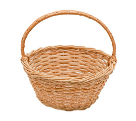 Wicker basket made of straw isolated on white background