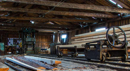 Fototapeta na wymiar Inside the old sawmill
