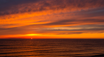 Golden sunset / dawn at sea