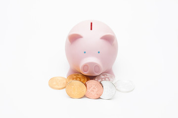 Saving bitcoin digital currency on piggy bank 