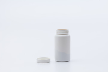 Template of a open white can of tablets 
