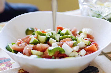 Salad of fresh tomatoes and cucumbers. Homemade natural food.