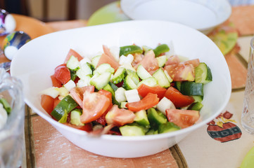 Salad of fresh tomatoes and cucumbers. Homemade natural food.