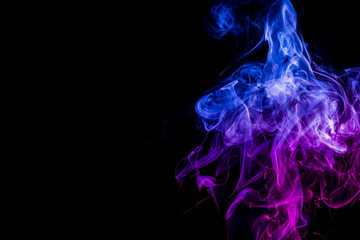 Colored smoke on black background